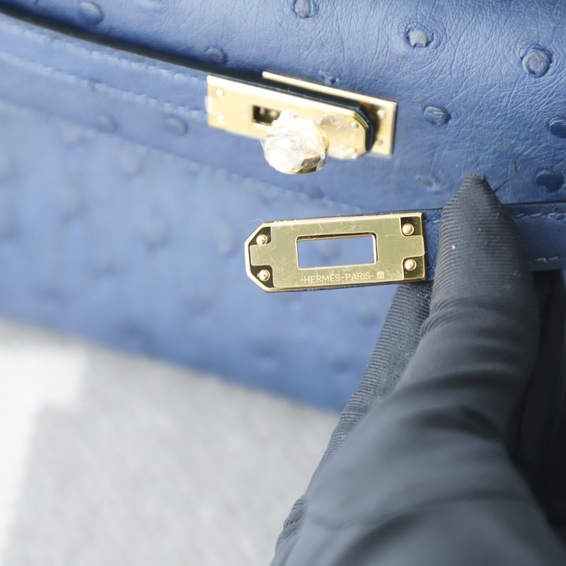 77 BIeu Iris ostrich kelly pochette with PHW