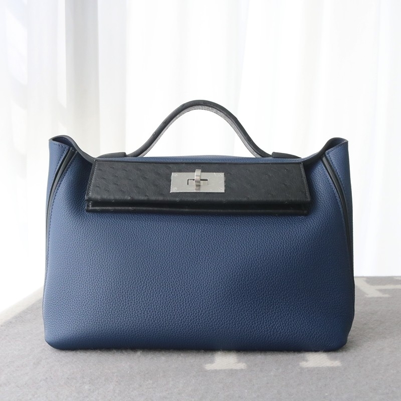 blue sapphire Clemence and black ostich kelly 24/24 with phw