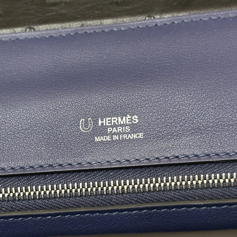 blue sapphire Clemence and black ostich kelly 24/24 with phw