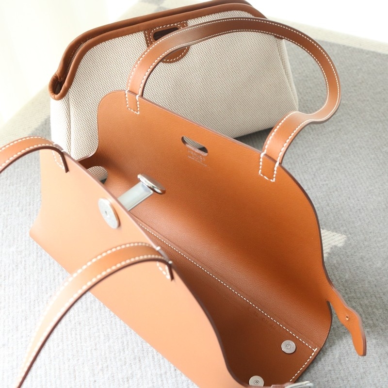 Hermes Tablier Sellier bag with Hunter cowhide, Swift calfskin and H canvas, Gold color, Phw