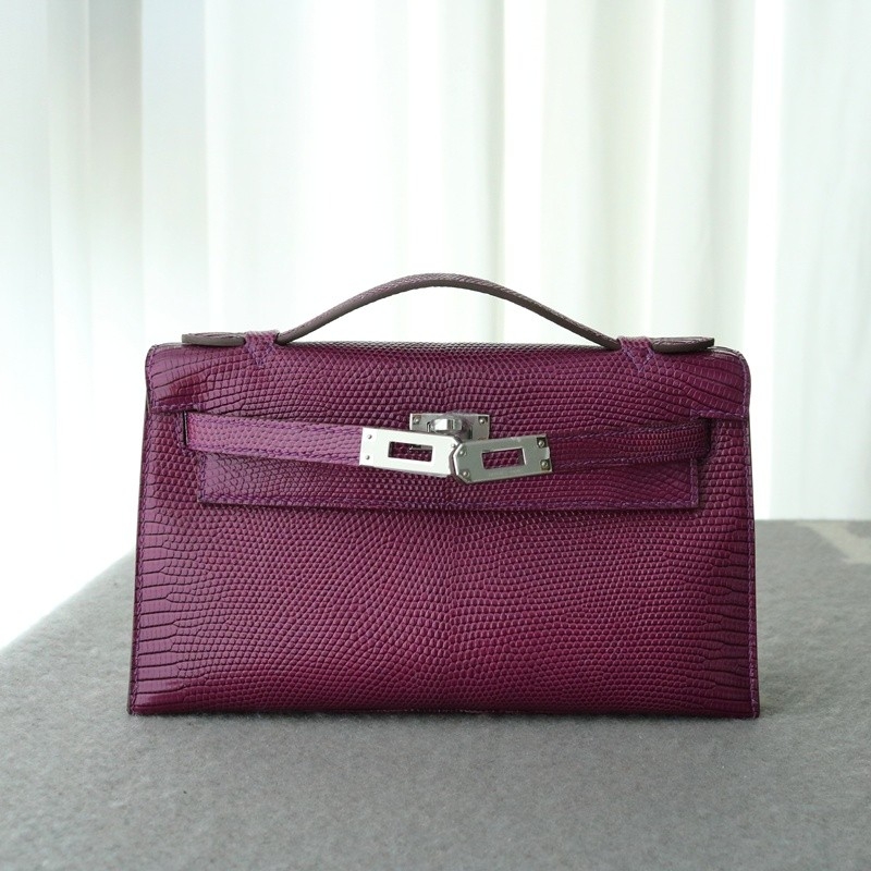 ultraviolet lizard kelly pochette with phw