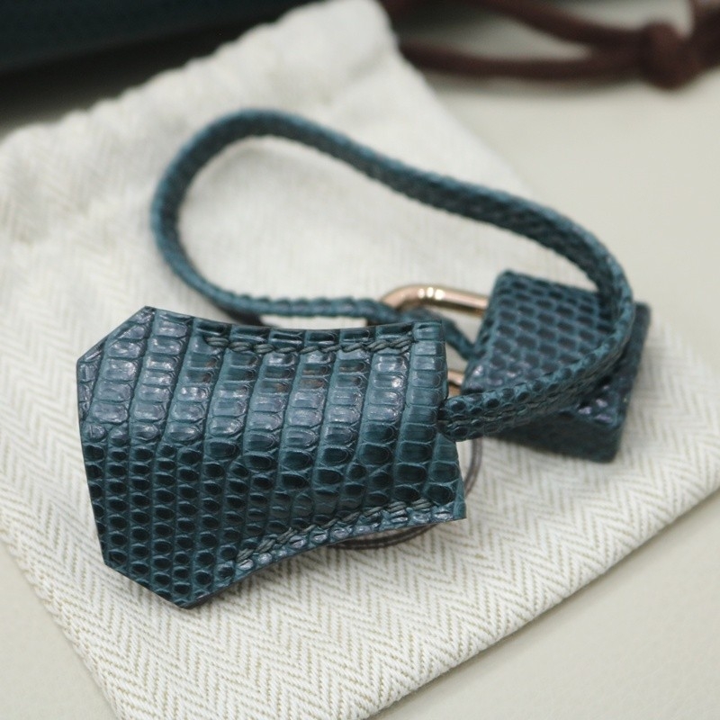 6O lizard birkin 25 retourne with rghw