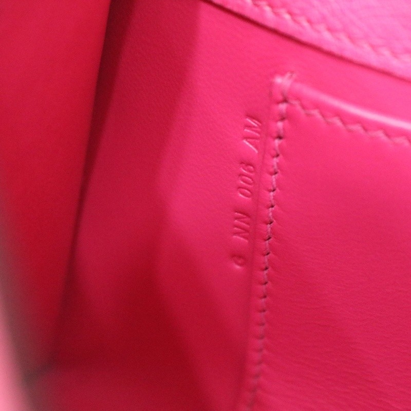 E5 Rose Tyrien ostrich kelly pochette with phw
