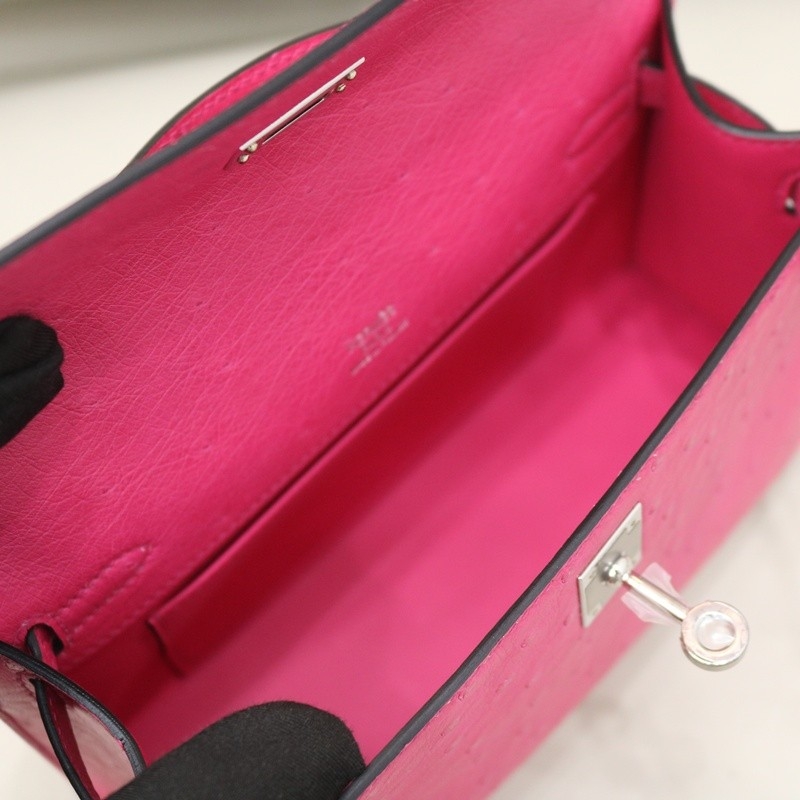 E5 Rose Tyrien ostrich kelly pochette with phw