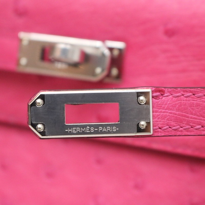 E5 Rose Tyrien ostrich kelly pochette with phw