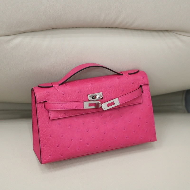 E5 Rose Tyrien ostrich kelly pochette with phw