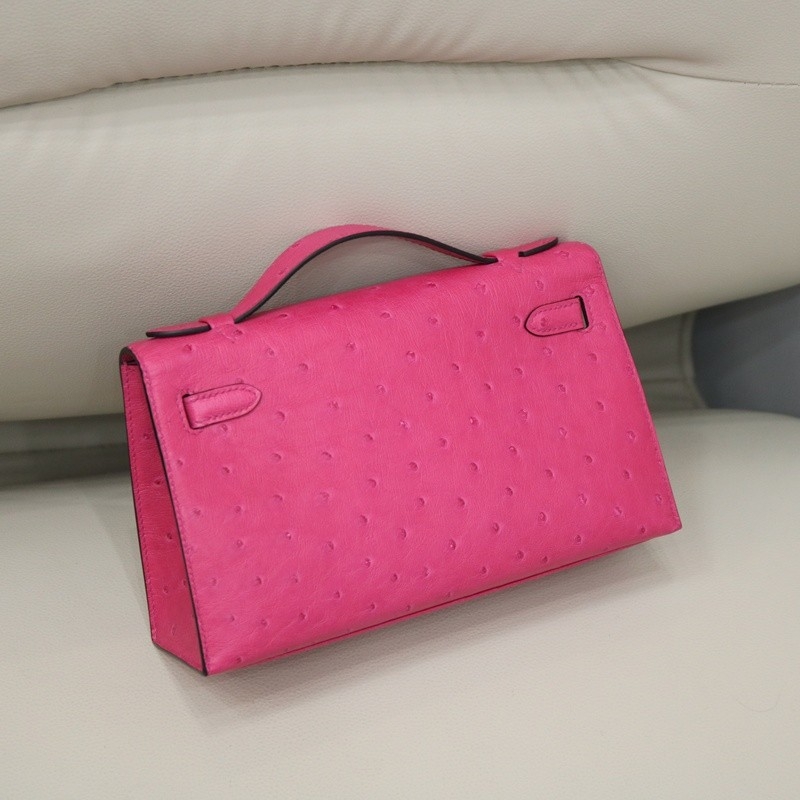 E5 Rose Tyrien ostrich kelly pochette with phw