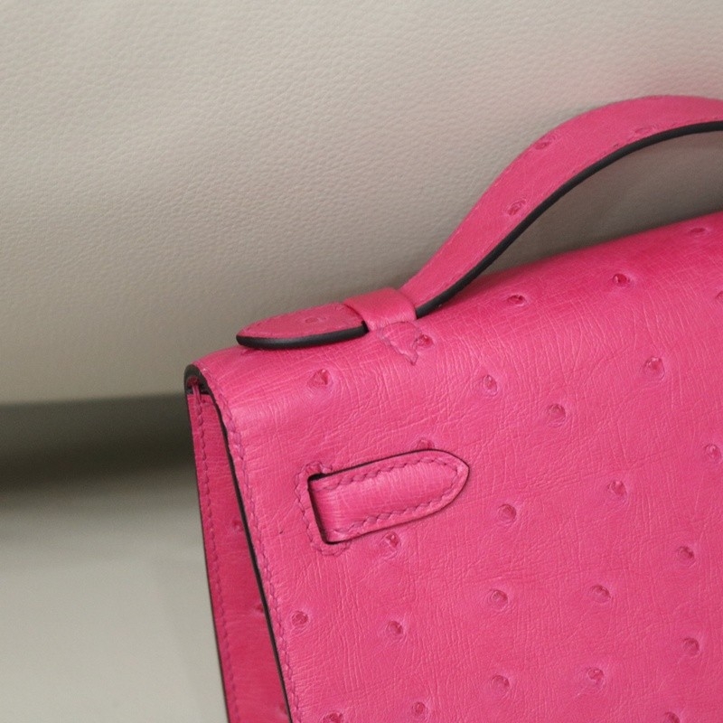 E5 Rose Tyrien ostrich kelly pochette with phw