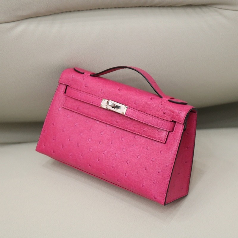 E5 Rose Tyrien ostrich kelly pochette with phw