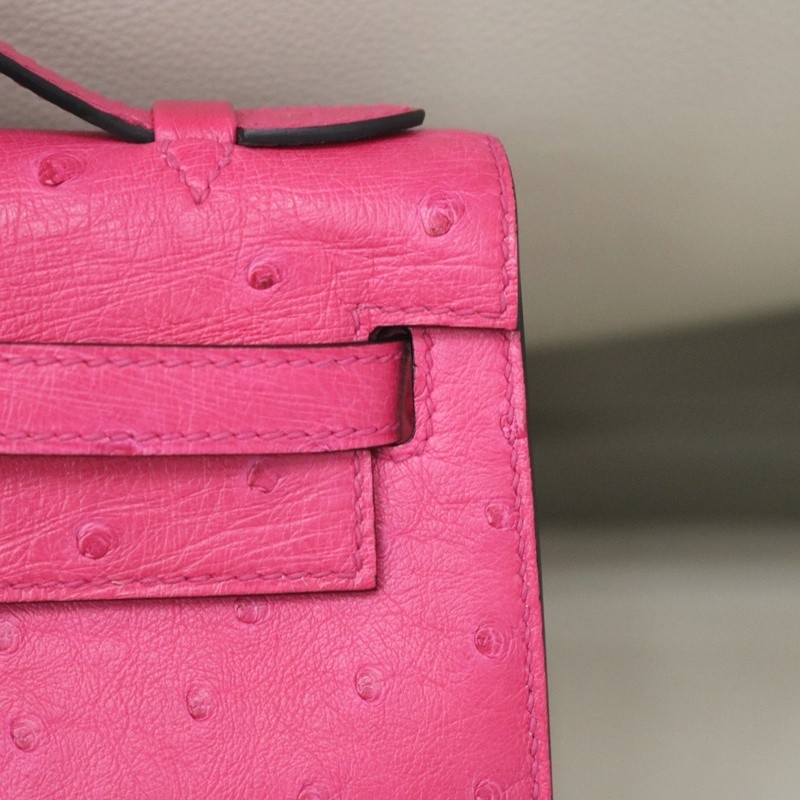 E5 Rose Tyrien ostrich kelly pochette with phw