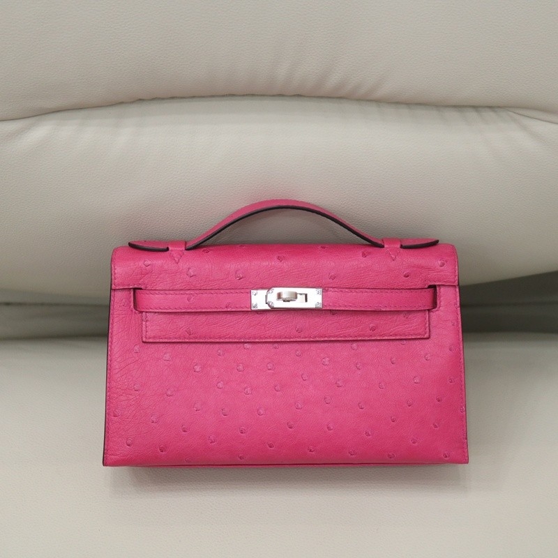 E5 Rose Tyrien ostrich kelly pochette with phw