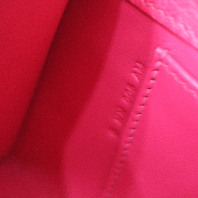 E5 Rose Tyrien ostrich kelly pochette with ghw