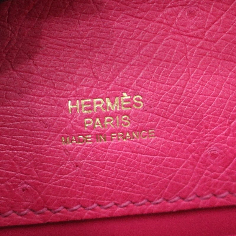 E5 Rose Tyrien ostrich kelly pochette with ghw