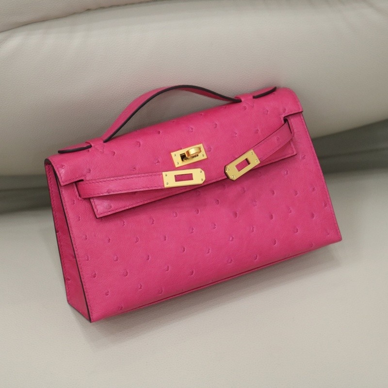 E5 Rose Tyrien ostrich kelly pochette with ghw