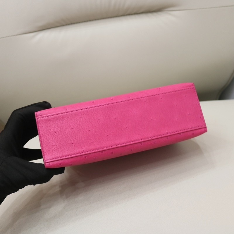 E5 Rose Tyrien ostrich kelly pochette with ghw