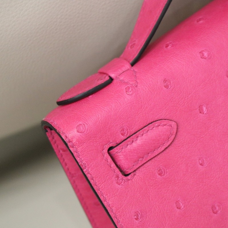 E5 Rose Tyrien ostrich kelly pochette with ghw