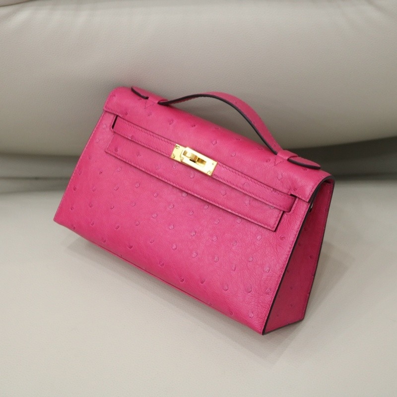 E5 Rose Tyrien ostrich kelly pochette with ghw