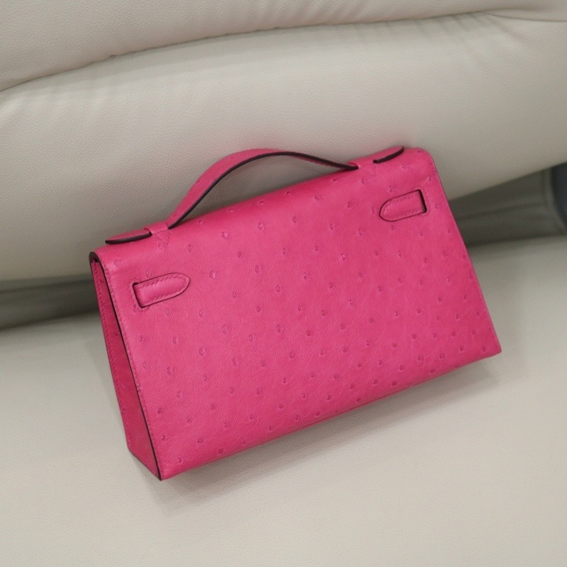 E5 Rose Tyrien ostrich kelly pochette with ghw
