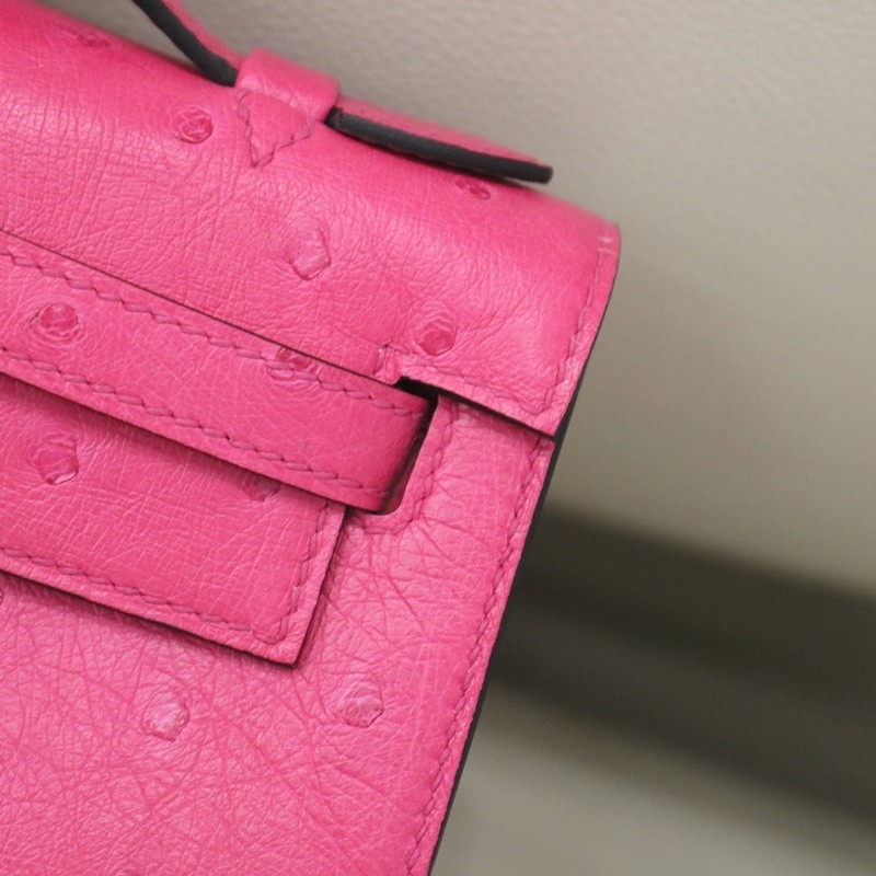 E5 Rose Tyrien ostrich kelly pochette with ghw