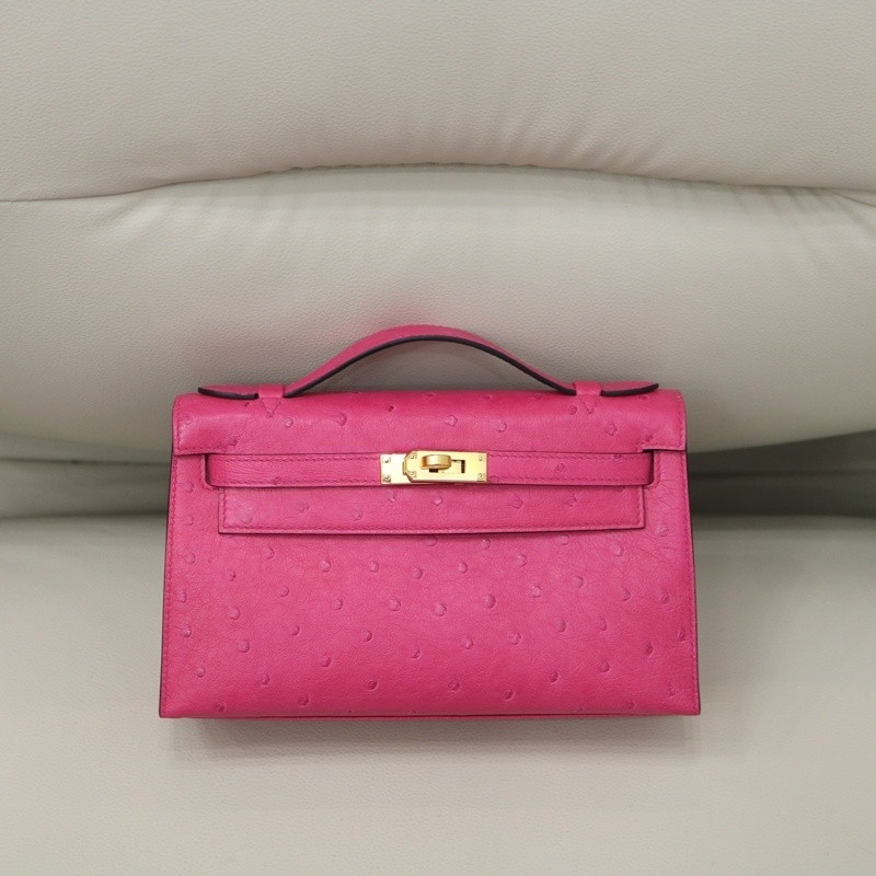 E5 Rose Tyrien ostrich kelly pochette with ghw